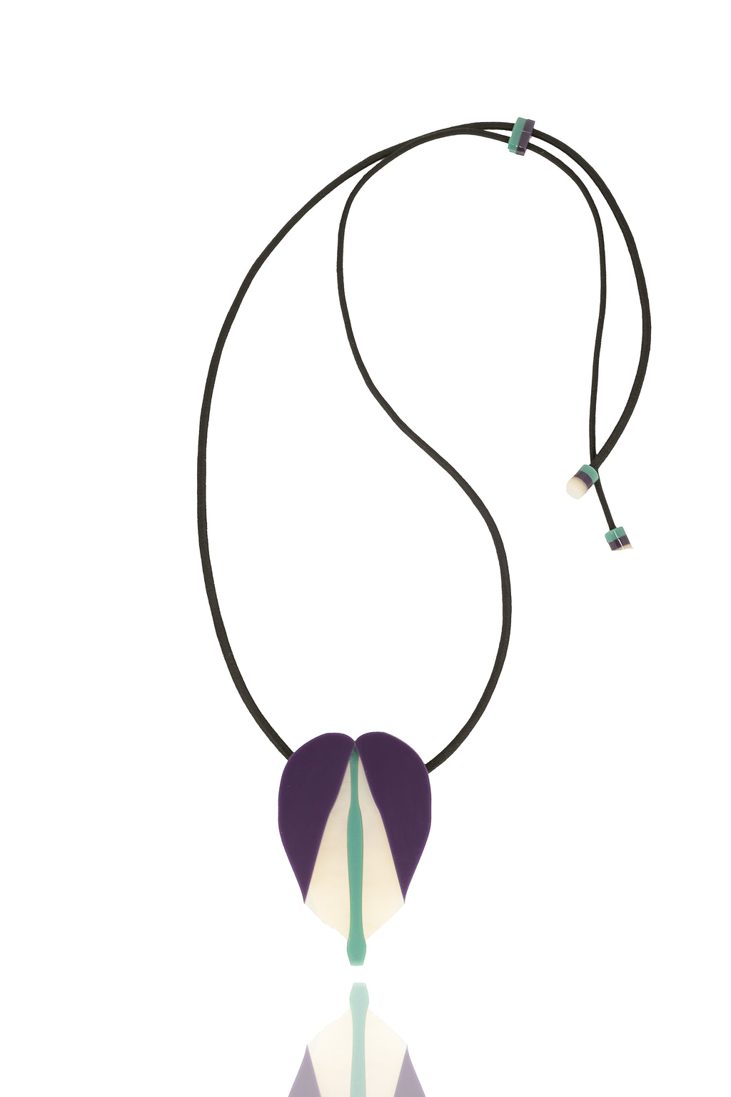 Long acrylic drop earrings in green, lilac, and teal. Lightweight, hypoallergenic, and handmade — sculptural flower-inspired statement jewelry by Dramma®.
