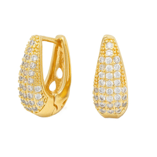 Gold pavé huggie earrings with sculptural glow. Lightweight, hypoallergenic, and elegant - for modern glam with a festive spark by DrammaⓇ.

