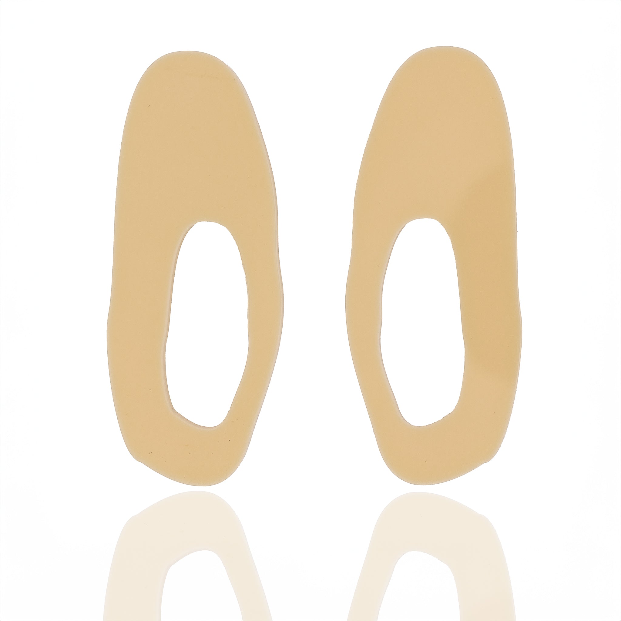 Acrylic drop earrings in soft butter cream. Lightweight, hypoallergenic, and handmade — sculptural design with fluid minimal lines