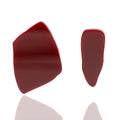 Asymmetric acrylic stud earrings in red. Lightweight, hypoallergenic, and handmade — sculptural geometric design with bold personality.