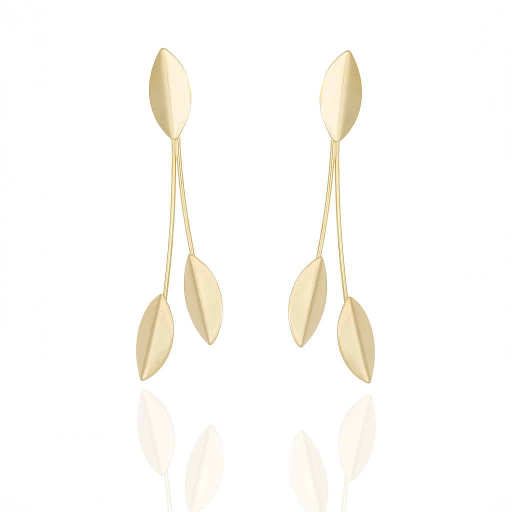 Gold dangle earrings with sculpted leaf design. Lightweight, hypoallergenic, and elegant — refined organic geometry by Dramma®.