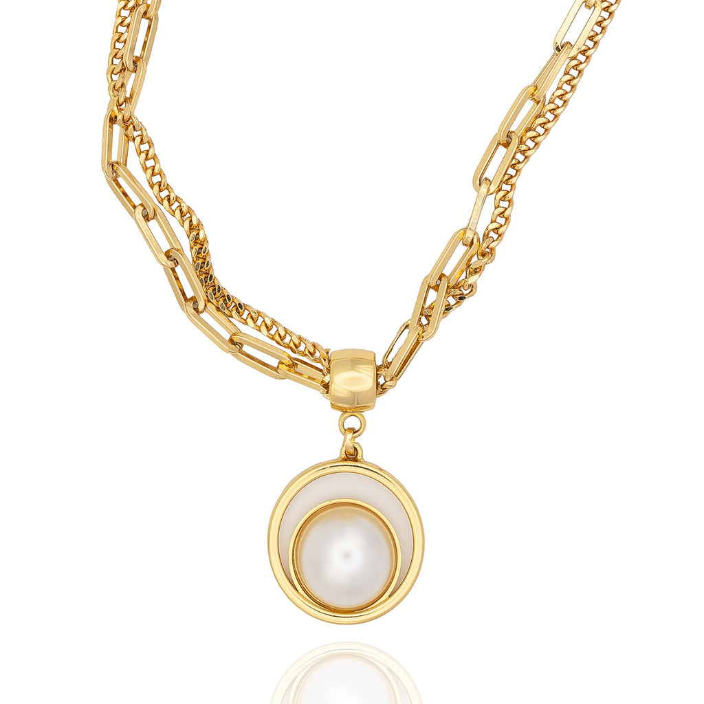  Double gold chain necklace with sculptural pearl pendant. Elegant, modern, and handcrafted with edge by DrammaⓇ.