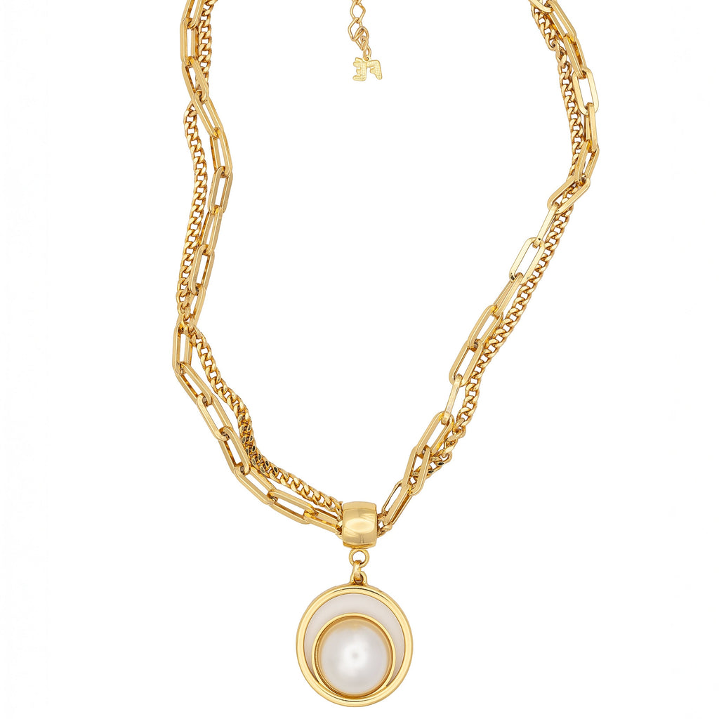  Double gold chain necklace with sculptural pearl pendant. Elegant, modern, and handcrafted with edge by DrammaⓇ.
