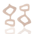 Asymmetric acrylic earrings in pearl rose. Lightweight, graphic, and hypoallergenic — handmade wearable art by Dramma®.
