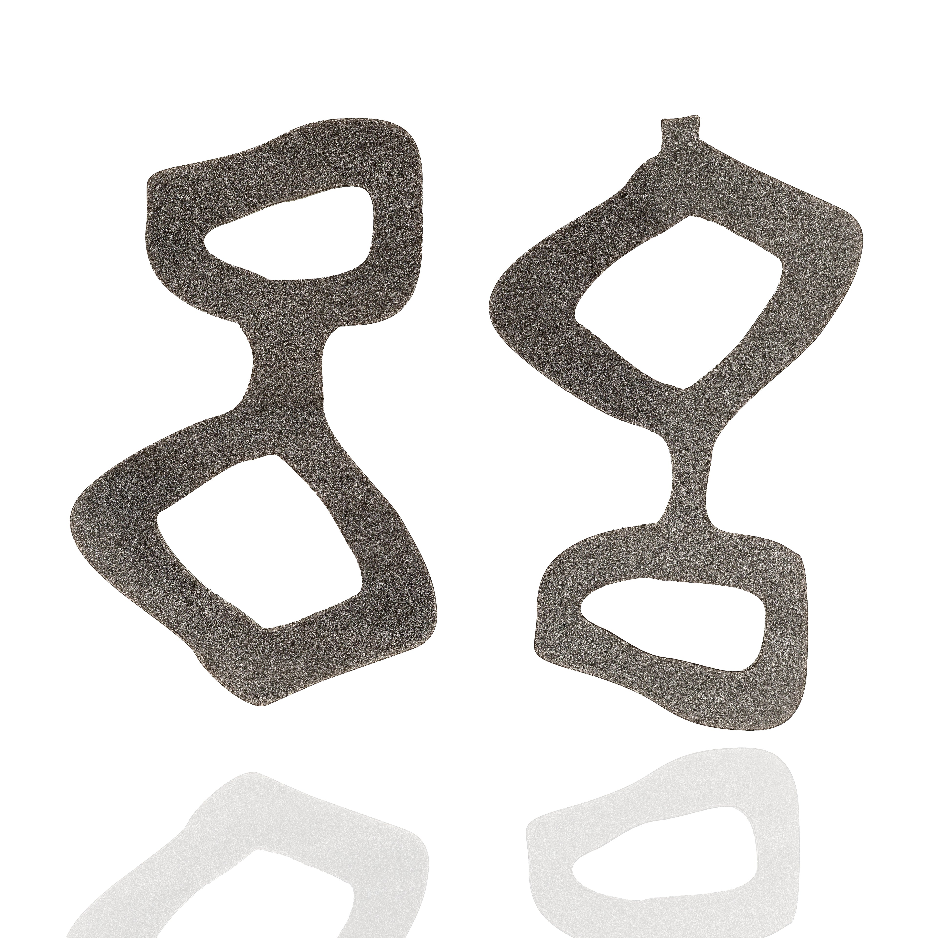 Handmade acrylic statement earrings in graphite gray. Lightweight, graphic, and hypoallergenic — wearable art by Dramma®.
