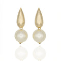 Gold teardrop earrings with a glossy pearl. Lightweight, sculptural, hypoallergenic. A dramatic take on timeless elegance by DrammaⓇ.
