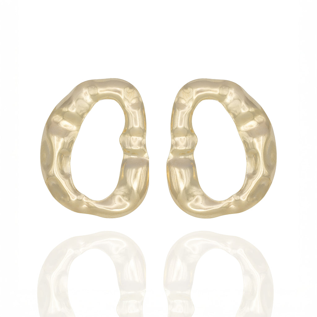 Gold-tone sculptural drop earrings with organic texture. Bold, reflective, and artfully raw by Dramma®.