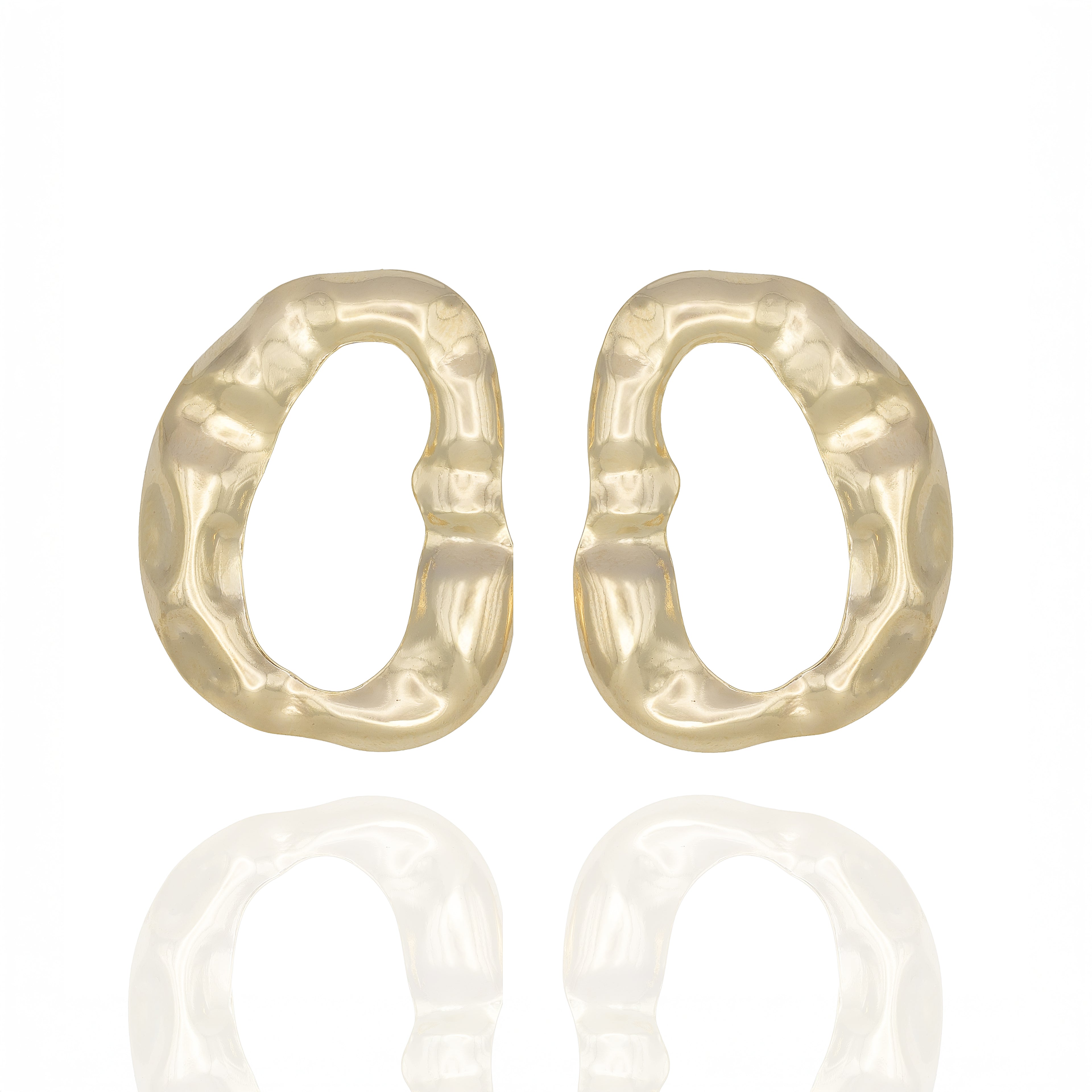 Gold-tone sculptural drop earrings with organic texture. Bold, reflective, and artfully raw by Dramma®.