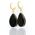 Black teardrop earrings with gold leverback clasp. Lightweight, hypoallergenic and handmade. A refined statement for everyday and evening wear by DrammaⓇ.
