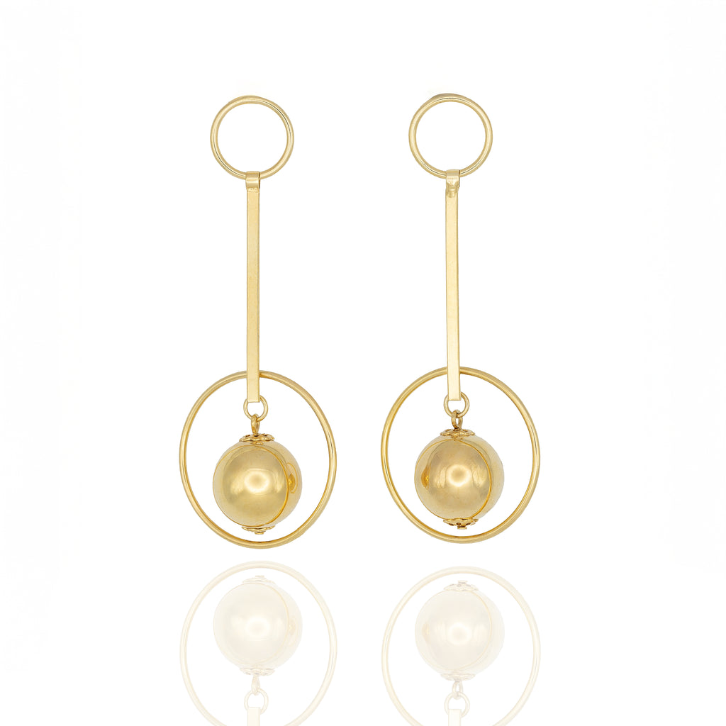 Gold dangle earrings with concentric rings and floating orb. Lightweight, hypoallergenic, and balanced — refined modern art by Dramma®
