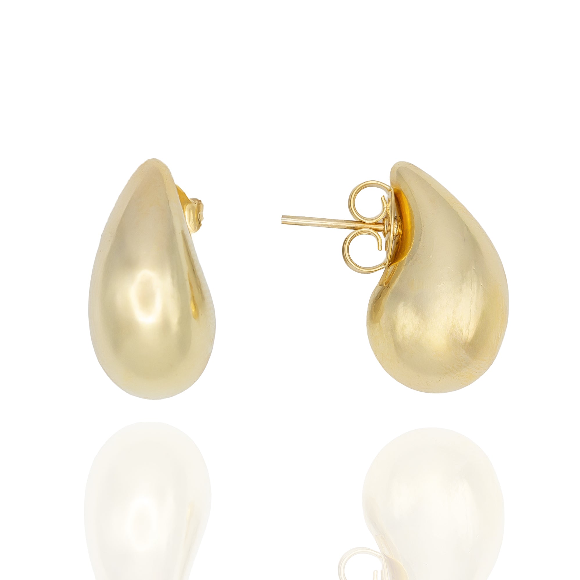 Sculptural silver teardrop earrings with smooth rounded shape. Lightweight, modern, and hypoallergenic by Dramma®.
