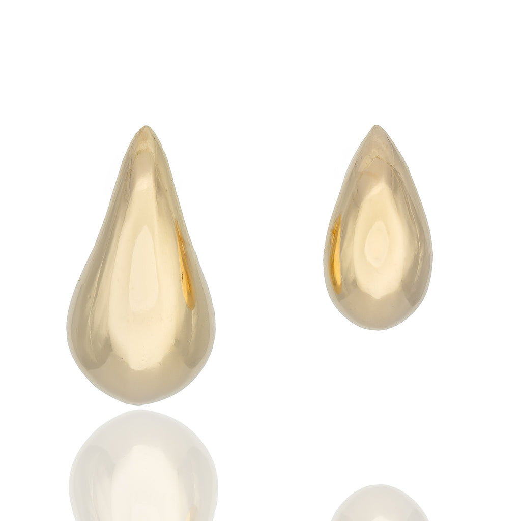 Bold gold drop earrings with sculptural teardrop silhouette. Lightweight, hypoallergenic, and refined by Dramma®.
