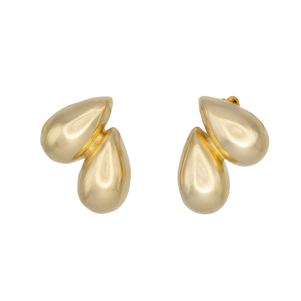 Sculptural gold teardrop studs from DRAMMA®. Small, lightweight, and hypoallergenic — refined everyday elegance with artistic presence.
